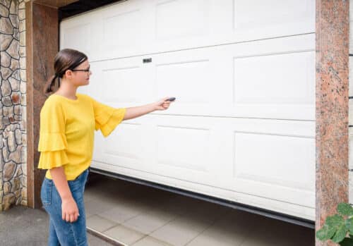 Is it safe to repair a garage door yourself